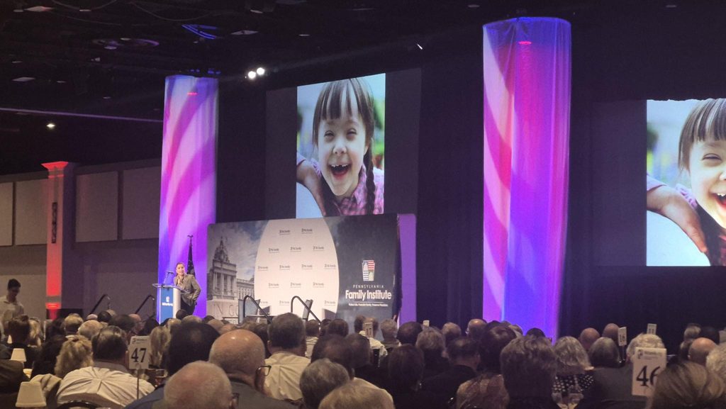 One of the evening's most moving moments came as Rachel introduced the audience to her youngest daughter, seven-year-old Valentina, who was born with Down syndrome. “Through Valentina, we are learning patience. We're learning compassion, authentic tolerance, and unconditional love,” Rachel shared. “She teaches us to be in the moment.”
